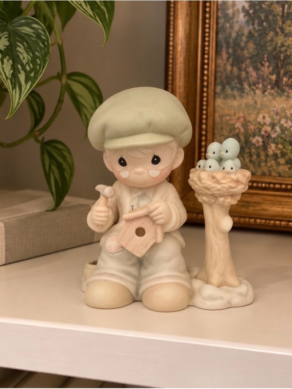 Precious Moments Cream and Light Blue Boy with Birdhouse Figurine